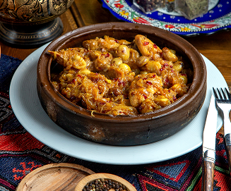 Photo du plat Tajine de poulet aux olives vertes et citrons confits
